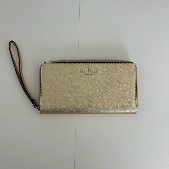 kate spade Handbags - Kate Spade Gold Wristlet Wallet